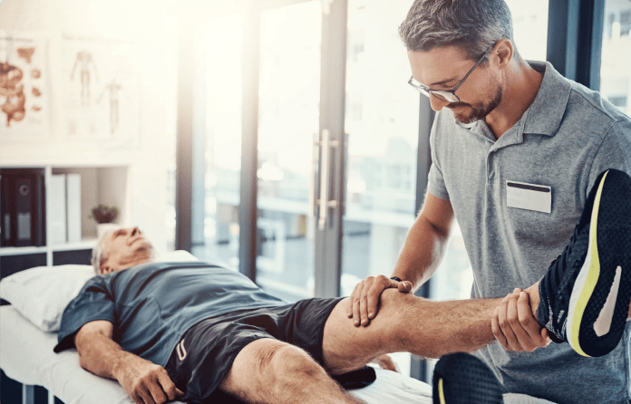 Physical therapist helping a client through a treatment session in Chico